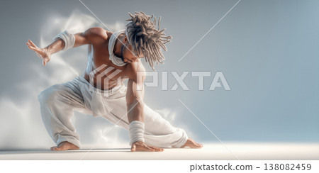 Explosive dance move captured in motion. Contemporary performer executes energetic pose surrounded by powder and cinematic lighting effects Explosive dance move captured in motion. Contemporary performer executes energetic pose surrounded by powder and cinematic lighting effects 138082459