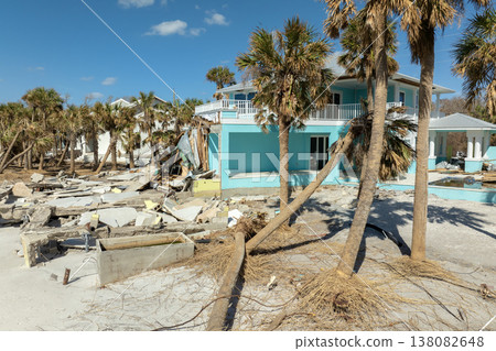 Ruined buildings in need of demolition or repair. Storm surge water and wind damaged houses roof and collapsed walls after hurricane in Florida Ruined buildings in need of demolition or repair. Storm surge water and wind damaged houses roof and collapsed walls after hurricane in Florida 138082648