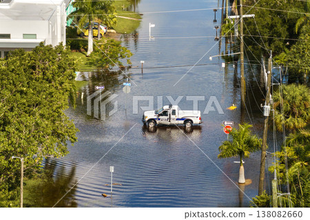 Road closed because of flooding danger with patrol police blocking driving of cars. Hurricane Milton aftermath in Punta Gorda, Florida Road closed because of flooding danger with patrol police blocking driving of cars. Hurricane Milton aftermath in Punta Gorda, Florida 138082660