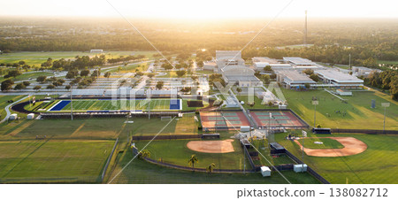 Public high school sports facilities in Florida. American football stadium, tennis courts and baseball diamond sport infrastructure 138082712