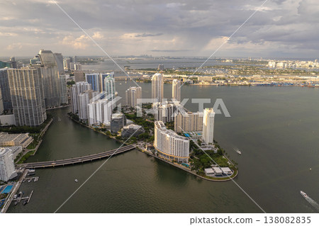 Miami Brickell Key Bridge. Urban landscape of downtown district of Miami in Florida, USA. Skyline with high skyscraper buildings in modern American city Miami Brickell Key Bridge. Urban landscape of downtown district of Miami in Florida, USA. Skyline with high skyscraper buildings in modern American city 138082835
