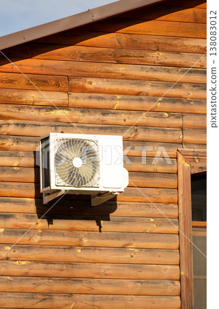 air conditioning on facade of building, air cooling in hot weather.  138083012
