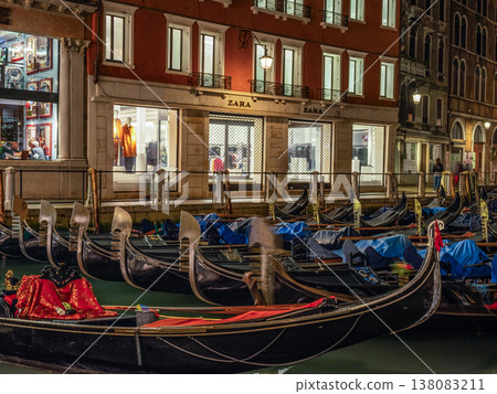 Landscape with Rialto Bridge and gondola Grand Canal in Venice, Italy, Europe. Landscape with Rialto Bridge and gondola Grand Canal in Venice, Italy, Europe. 138083211