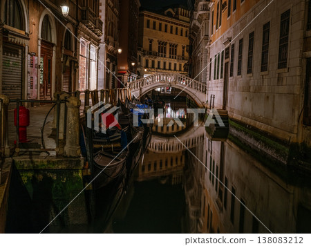 Landscape with Rialto Bridge and gondola Grand Canal in Venice, Italy, Europe. 138083212