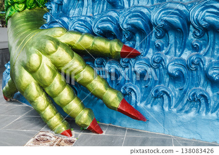 Close-up of colorful mythical creature claw detail at Plai Laem temple Koh Samui Thailand Close-up of colorful mythical creature claw detail at Plai Laem temple Koh Samui Thailand 138083426