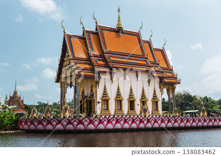 Traditional Thai temple building surrounded by water at Plai Laem temple on Koh Samui 138083462