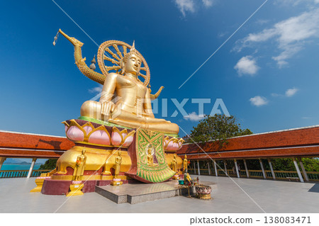 Golden Big Buddha statue on lotus base at Wat Phra Yai temple on Koh Samui island in Thailand Golden Big Buddha statue on lotus base at Wat Phra Yai temple on Koh Samui island in Thailand 138083471