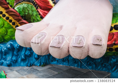 Close-up of giant statue foot with detailed toes at Plai Laem temple Koh Samui Thailand Close-up of giant statue foot with detailed toes at Plai Laem temple Koh Samui Thailand 138083514