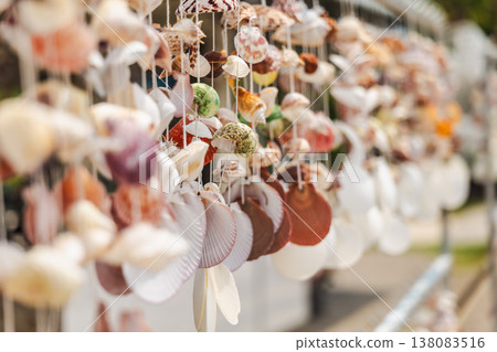 Colorful seashell wind chimes hanging in outdoor market near beach Koh Samui Thailand 138083516