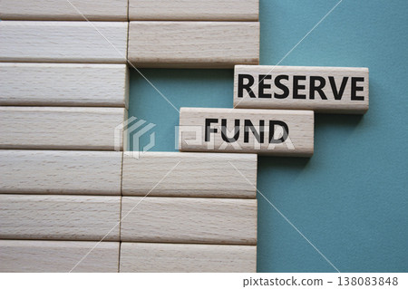 Reserve Fund symbol. Concept word Reserve Fund on wooden blocks. Beautiful grey green background. Business and Reserve Fund concept. Copy space Reserve Fund symbol. Concept word Reserve Fund on wooden blocks. Beautiful grey green background. Business and Reserve Fund concept. Copy space 138083848