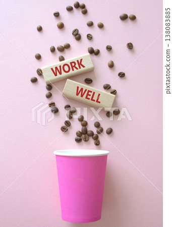 Work Well symbol. Concept word Work Well on wooden blocks. Beautiful pink background with coffee cup. Business and Work Well concept. Copy space Work Well symbol. Concept word Work Well on wooden blocks. Beautiful pink background with coffee cup. Business and Work Well concept. Copy space 138083885