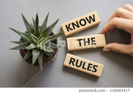 Know the rules symbol. Wooden blocks with words Know the rules. Businessman hand. Beautiful grey background with succulent plant. Business and Know the rules concept. Copy space. Know the rules symbol. Wooden blocks with words Know the rules. Businessman hand. Beautiful grey background with succulent plant. Business and Know the rules concept. Copy space. 138083917