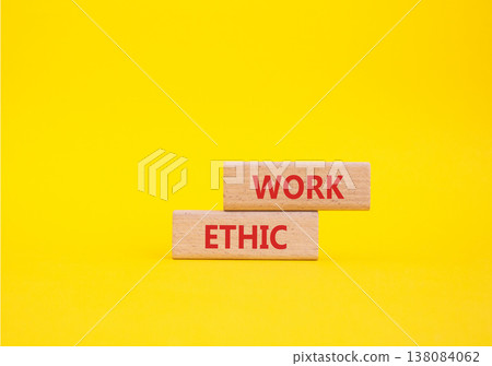 Work Ethic symbol. Concept words Work Ethic on wooden blocks. Beautiful yellow background. Business and Work Ethic concept. Copy space. 138084062