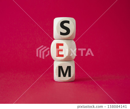 SEM - Search Engine Marketing symbol. Wooden cubes with words SEM. Beautiful red background. Business and SEM concept. Copy space. SEM - Search Engine Marketing symbol. Wooden cubes with words SEM. Beautiful red background. Business and SEM concept. Copy space. 138084141