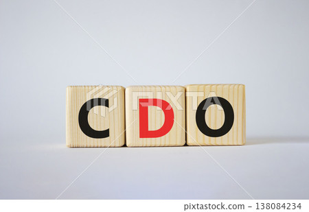CDO - Collateralized Debt Obligation symbol. Wooden cubes with word CDO. Beautiful white background. Business and Collateralized Debt Obligation concept. Copy space. 138084234