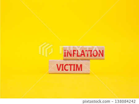 Inflation Victim symbol. Wooden blocks with words Inflation Victim. Beautiful yellow background. Business and Inflation Victim concept. Copy space. Inflation Victim symbol. Wooden blocks with words Inflation Victim. Beautiful yellow background. Business and Inflation Victim concept. Copy space. 138084242