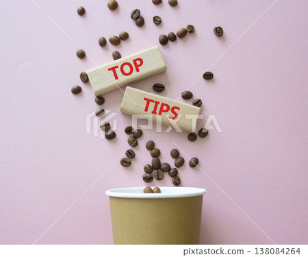 Top Tips symbol. Wooden blocks with words Top Tips. Beautiful pink background with coffee cup and coffee beans. Business and Top Tips concept. Copy space. Top Tips symbol. Wooden blocks with words Top Tips. Beautiful pink background with coffee cup and coffee beans. Business and Top Tips concept. Copy space. 138084264
