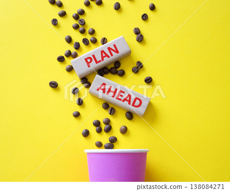 Plan ahead symbol. Wooden blocks with words Plan ahead. Beautiful yellow background with coffee cup and coffee beans. Business and Plan ahead concept. Copy space. Plan ahead symbol. Wooden blocks with words Plan ahead. Beautiful yellow background with coffee cup and coffee beans. Business and Plan ahead concept. Copy space. 138084271