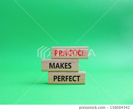 Practice Makes Perfect symbol. Wooden blocks with words Practice Makes Perfect. Beautiful green background. Business and Practice Makes Perfect concept. Copy space. 138084342