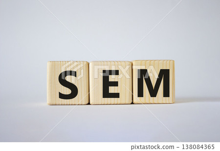 SEM - Search Engine Marketing symbol. Wooden cubes with words SEM. Beautiful white background. Business and SEM concept. Copy space. 138084365