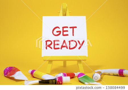 Get ready symbol. Wooden blocks with words Get ready. Beautiful yellow background with paints and easel. Business and Get ready concept. Copy space. Get ready symbol. Wooden blocks with words Get ready. Beautiful yellow background with paints and easel. Business and Get ready concept. Copy space. 138084499
