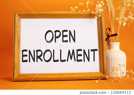 Open Enrollment symbol. Concept words Open Enrollment on beautiful wooden picture frame. Beautiful orange background with flower vase. Business and Open Enrollment concept. Copy space. Open Enrollment symbol. Concept words Open Enrollment on beautiful wooden picture frame. Beautiful orange background with flower vase. Business and Open Enrollment concept. Copy space. 138084513