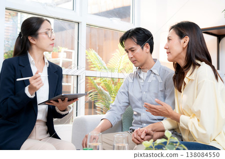 Asian couple therapy counseling and relationship support, mental health, consultation about anxiety. Asian couple therapy counseling and relationship support, mental health, consultation about anxiety. 138084550
