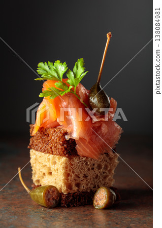 Open sandwich with smoked salmon and capers. Open sandwich with smoked salmon and capers. 138084981