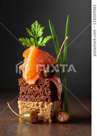 Open sandwich with smoked salmon and capers. Open sandwich with smoked salmon and capers. 138084982