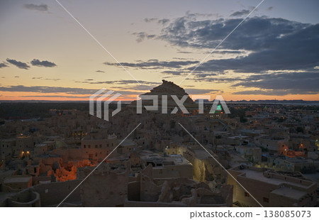 The Shari ruins as night falls and the city of Siwa beginning to light up. The Shari ruins as night falls and the city of Siwa beginning to light up. 138085073