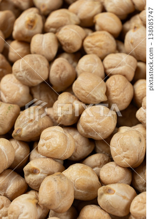 Macro texture of organic raw chickpea seeds. Macro texture of organic raw chickpea seeds. 138085747