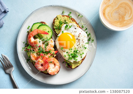 Avocado Shrimp and Fried Egg Breakfast Sandwiches 138087520