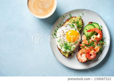 Avocado Shrimp and Fried Egg Breakfast Sandwiches 138087522