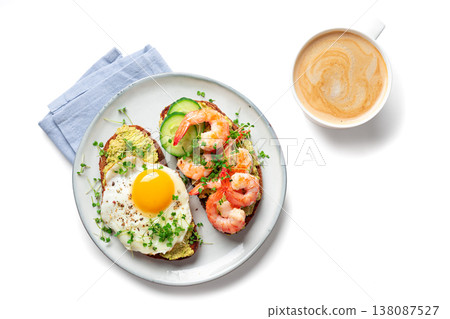 Avocado Shrimp and Fried Egg Breakfast Sandwiches and Coffee 138087527