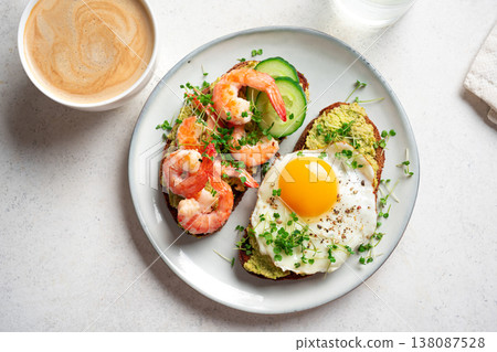 Avocado Shrimp and Fried Egg Breakfast Sandwiches and Coffee Avocado Shrimp and Fried Egg Breakfast Sandwiches and Coffee 138087528