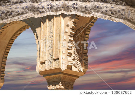 Arches in Islamic (Moorish) style (against the sunset) in Alhambra, Granada, Spain Arches in Islamic (Moorish) style (against the sunset) in Alhambra, Granada, Spain 138087692