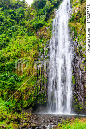 View of Materuni waterfall on the foot of the Kilimanjaro mountain in Tanzania View of Materuni waterfall on the foot of the Kilimanjaro mountain in Tanzania 138087988