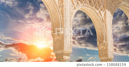 Arches in Islamic (Moorish)  style (against the sunset) in Alhambra, Granada, Spain 138088159
