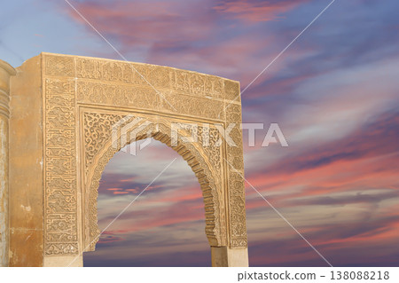 Arches in Islamic (Moorish) style (against the sunset) in Alhambra, Granada, Spain Arches in Islamic (Moorish) style (against the sunset) in Alhambra, Granada, Spain 138088218