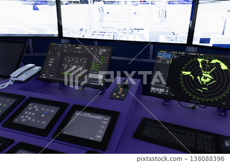 Modern ship bridge navigation console with digital screens Modern ship bridge navigation console with digital screens 138088396