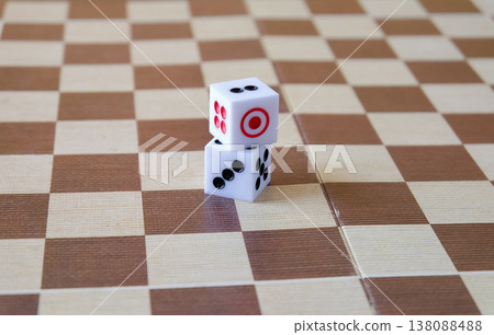 dice on dart board for gambling on color background. dice on dart board for gambling on color background. 138088488