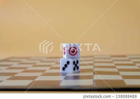 dice on dart board for gambling on color background. dice on dart board for gambling on color background. 138088489