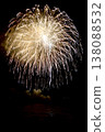 Nagaoka Festival Grand Fireworks Display: Golden fireworks shining in the night sky over the Shinano River (vertical composition) 138088532