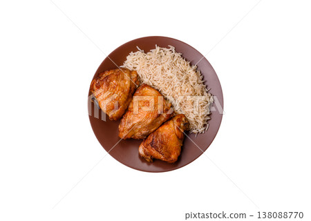 Kabsa or haneeth, an Arabic dish with rice and chicken, salt, and spices. Kabsa or haneeth 138088770