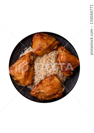Kabsa or haneeth, an Arabic dish with rice and chicken, salt, and spices. Kabsa or haneeth 138088771