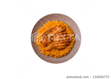 Kabsa or haneeth, an Arabic dish with rice and chicken, salt, and spices. Kabsa or haneeth Kabsa or haneeth, an Arabic dish with rice and chicken, salt, and spices. Kabsa or haneeth 138088775