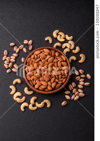 Raw and peeled almonds as a healthy food ingredient. Almonds as a food background Raw and peeled almonds as a healthy food ingredient. Almonds as a food background 138088847