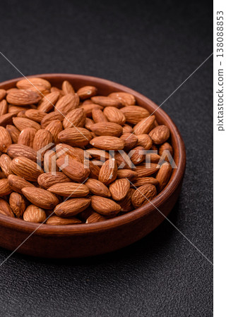 Raw and peeled almonds as a healthy food ingredient. Almonds as a food background Raw and peeled almonds as a healthy food ingredient. Almonds as a food background 138088853