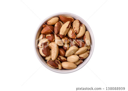 Brazil nuts, raw and shelled, are a source of selenium and a healthy food ingredient. Brazil nuts 138088939