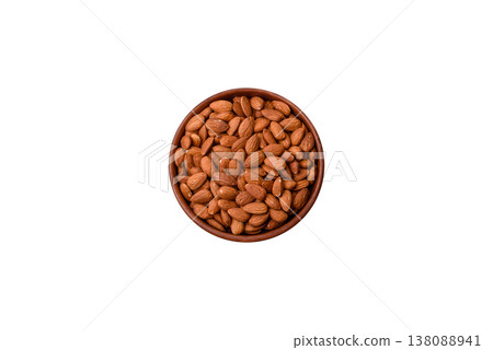 Raw and peeled almonds as a healthy food ingredient. Almonds as a food background Raw and peeled almonds as a healthy food ingredient. Almonds as a food background 138088941